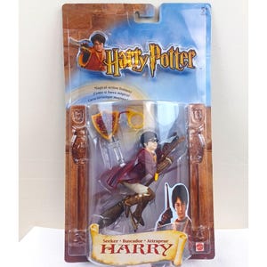 May include: A set of three ceramic mugs with a speckled, matte finish. The mugs are in shades of cream, light gray, and dark gray. Each mug has a simple, minimalist design and a rounded handle.