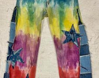 Hand Tie dyed Levi y2k jeans with one of a kind scavenger star patches