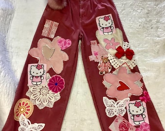 Hello Kitty patchwork jeans with crochet patches and extras!  Super cute wide leg jeans.
