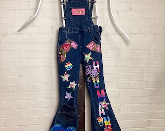 We are all HUMAN Vibrant appliquéd overalls.