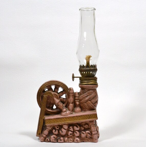 Items similar to Oil Lamp. Fashioned as a spinning wheel. Made in Japan
