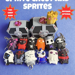 May include: Two black and gray treasure chests with pink crystal accents, accompanied by a collection of small, colorful character figurines and keychains. Text reads: SPRITE CHEST AND SPRITES, TWO CHEST SIZES, KEYCHAIN OPTIONAL. The figures feature various designs.