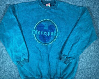 Sudadera vintage de los 90 de Disneyland, 1996, Mickey Mouse, color verde azulado, cuello redondo, estilo desgastado, fabricada en EE. UU., talla M para hombre.
