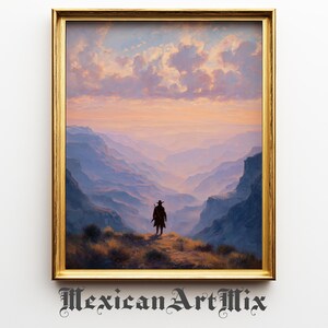 May include: A framed landscape painting with a gold-colored frame. The artwork depicts a lone figure in silhouette, standing on a ridge overlooking a vast canyon. The sky is filled with pastel colors, and the text "Mexican Art Mix" is at the bottom.