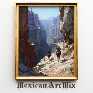 May include: A framed landscape painting depicting a canyon scene with riders on horseback. The artwork features a gold frame and the text "Mexican Art Mix" at the bottom. The canyon walls are reddish-brown, and the sky is a clear blue.
