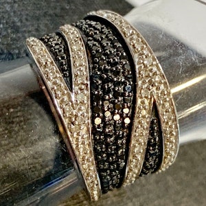 Black and white diamonds set in sterling silver band