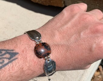 Spoon bracelet made with vintage silverware, and a mahogany obsidian gemstone