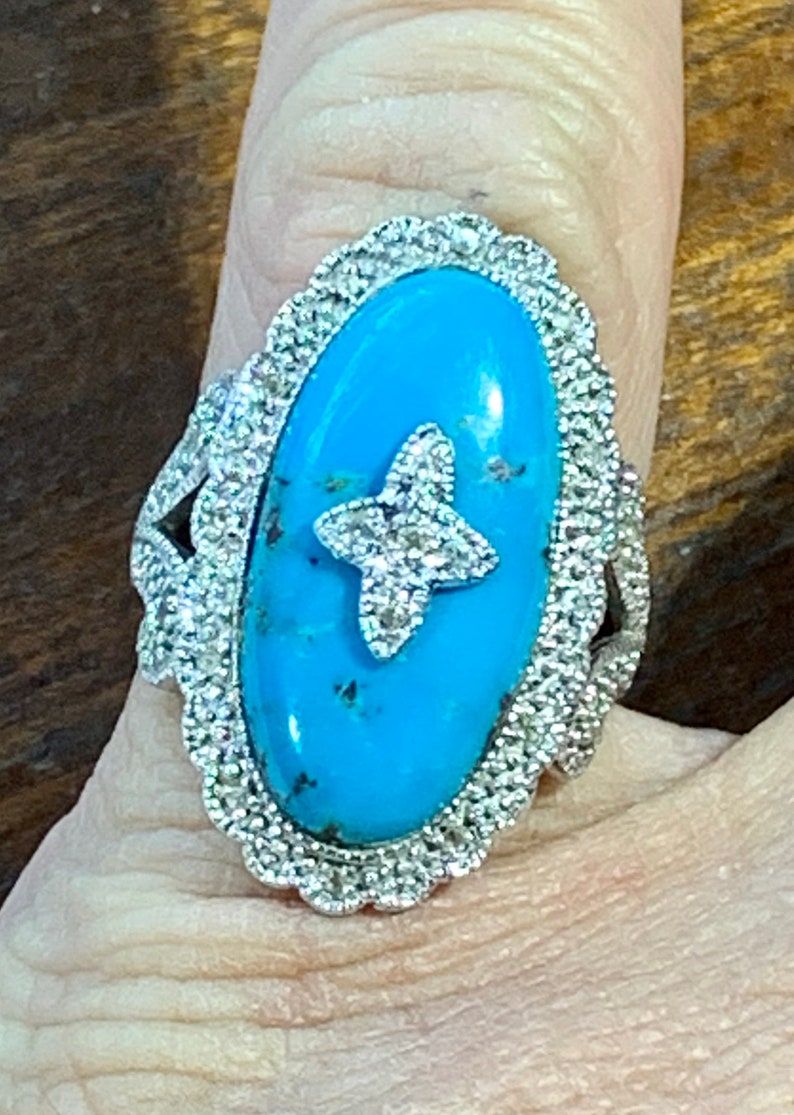 Beautiful turquoise and diamonds sterling silver ring an amazingly beautiful ring picture doesn\u2019t do justice In a size 5 12