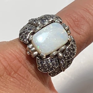 Amazing white Australian opal with quartz crystal accent stones set in sterling silver In a size 7