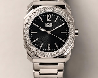 Reloj Ice Master para hombre con bisel de cristal plateado, esfera negra y brazalete de acero inoxidable.