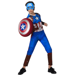 May include: A Captain America costume featuring a blue jumpsuit with a star emblem, a brown and white torso design, and brown boot covers. The costume includes a blue mask and a red, white, and blue shield.