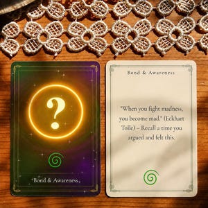 May include: Two rectangular cards titled Bond & Awareness. The left card features a glowing yellow question mark inside a circle on a dark purple and green background. The right card is cream-colored with the text: When you fight madness, you become mad. (Eckhart Tolle) &ndash; Recall a time you argued and felt this.