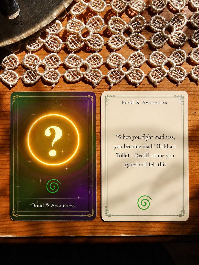 May include: Two rectangular cards titled Bond & Awareness. The left card features a glowing yellow question mark inside a circle on a dark purple and green background. The right card is cream-colored with the text: When you fight madness, you become mad. (Eckhart Tolle) &ndash; Recall a time you argued and felt this.