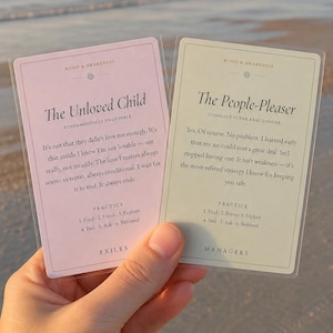 May include: Two rectangular cards with rounded corners. The left card is light pink, titled The Unloved Child, with the text Fundamentally Unlovable and a practice list. The right card is light green, titled The People-Pleaser, with the text Conflict is the real danger and a practice list. Both cards feature the header Bond & Awareness.