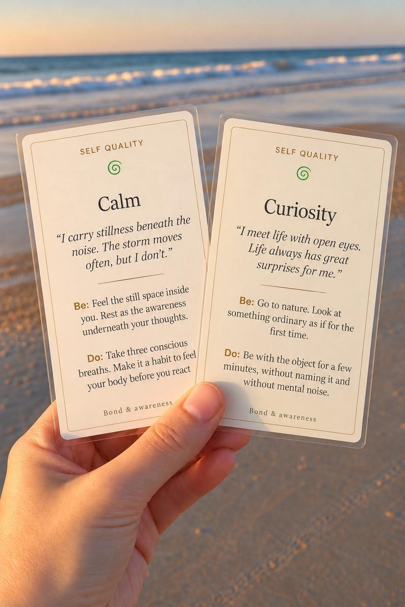 May include: Two rectangular off-white cards with rounded corners, each titled Self Quality. The left card features the word Calm and text about stillness. The right card features the word Curiosity and text about meeting life with open eyes. Both cards include Be and Do prompts.