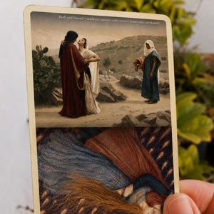 May include: A rectangular card featuring two distinct artworks. The top image depicts Ruth and Naomi in a desert landscape, while the bottom image, titled The Kiss - Edward Killing, 1867, shows two figures embracing in a textured, dark setting.