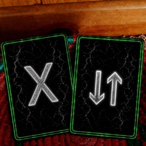 May include: Two rectangular cards with a black background featuring a cracked texture and a glowing green border. The left card displays a large white letter X. The right card displays a white downward-pointing arrow and a white upward-pointing arrow.