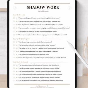 May include: A digital tablet displaying a Shadow Work journal prompt page with sections titled Soul & Meaning, Fear & Self-Perception, and Gratitude & Growth. The document features numbered questions from 31 to 48 with checkboxes for tracking progress.