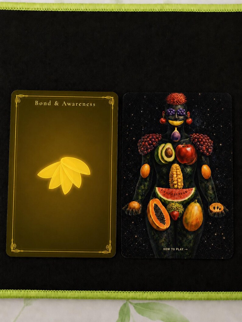 May include: Two rectangular cards. The left card is dark gold with the text Bond & Awareness and a yellow leaf icon. The right card features a dark, starry background with a human figure composed of various fruits, including grapes, apples, and papaya.