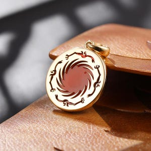 Ancient Sunbird Red Agate Pendant Gold Plated Prosperity Charm