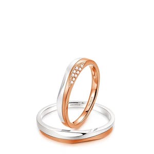 May include: A set of three ceramic mugs with a speckled, matte finish. The mugs are in shades of cream, light gray, and dark gray. Each mug has a simple, minimalist design, perfect for coffee or tea.