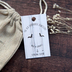 May include: Sterling silver fox stud earrings on a white card with the text "The Old Farmhouse Jewellery" and "Made in Cornwall". The earrings are packaged in a small, white drawstring bag.