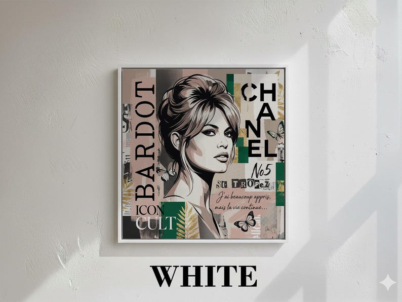 May include: A framed art print featuring a portrait of a woman with the text "BARDOT" and "CHANEL No5". The artwork has a collage style with butterflies and French text. The frame is white, and the background is a white wall.