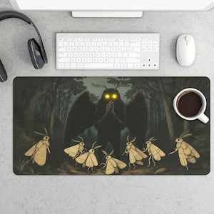 May include: A set of three ceramic mugs with a speckled, matte finish. The mugs are in shades of cream, light gray, and dark gray. Each mug has a simple, minimalist design, perfect for coffee or tea.