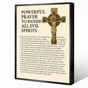 May include: A framed print with a cream-colored background and black frame. The print features a gold-colored crucifix with the text "POWERFUL PRAYER TO BANISH ALL EVIL SPIRITS" and a prayer. The image includes the text "INRI".