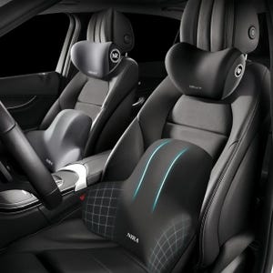 May include: Black car seat headrests and lumbar support pillows. The headrests have a circular logo with the letters "NR". The lumbar support pillows have a grid pattern and the word "NIRA". The pillows have blue accent lines.