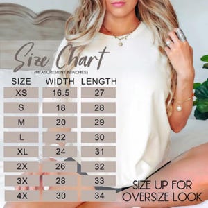 May include: A white t-shirt displayed with a size chart overlay. The chart lists sizes XS through 4X with corresponding width and length measurements in inches. Text on the image includes Size Chart, Measurement in Inches, and Size up for oversize look.