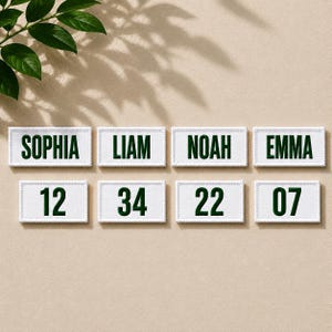 May include: Eight rectangular white patches with dark green embroidered text and numbers. The top row features the names SOPHIA, LIAM, NOAH, and EMMA. The bottom row displays the numbers 12, 34, 22, and 07 in a matching dark green font.