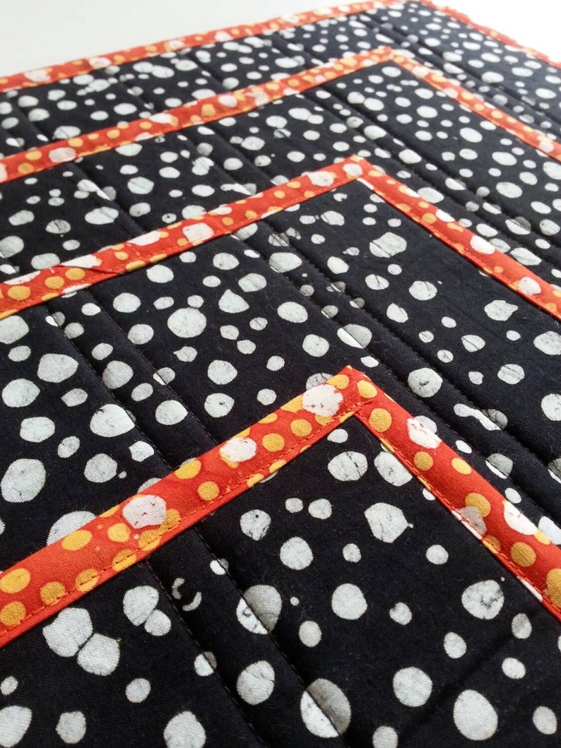 SOLD Four quilted placemats bright summer colors batik cotton sunflowers polka dots black red multi color patio placemats washablereversible