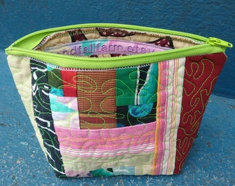 SOLD Travel zipper pouch handmade by me with recycled fabric scraps! Perfect gift for bridesmaids, holidays, office party, kid's birthday