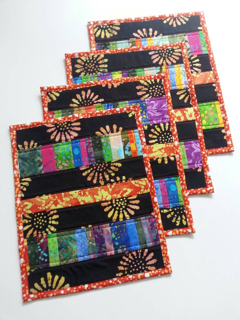 SOLD Four quilted placemats bright summer colors batik cotton sunflowers polka dots black red multi color patio placemats washablereversible