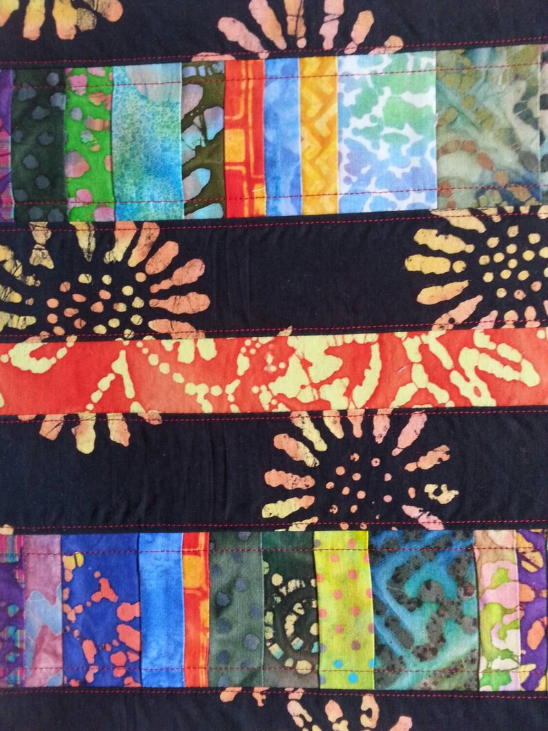 SOLD Four quilted placemats bright summer colors batik cotton sunflowers polka dots black red multi color patio placemats washablereversible