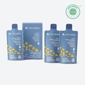 May include: A collection of Norwex All-in-1 Bathroom Cleaner Concentrate packets and a box. The packets and box are light blue with yellow and white graphics. Each packet contains 30 ml / 1 fl oz of concentrate. The packaging includes the EWG Verified logo.