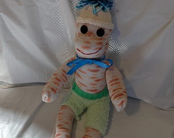 Speckled sock monkey