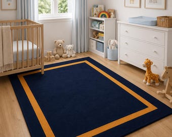 Absolutely. For this navy blue + gold geometric border rug in a nursery, I’d use a title that targets both nursery decor and modern rug