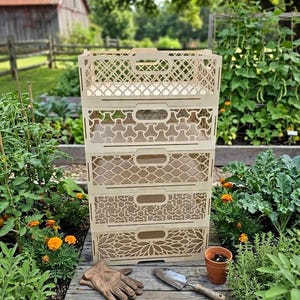 May include: A set of three ceramic mugs with a speckled, matte finish. The mugs are in shades of cream, light gray, and dark gray. Each mug has a simple, minimalist design and a rounded handle. Perfect for coffee or tea.