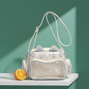 Bolso Ita, mini mochila Y2K, bolsos cruzados, expositor de pines, bolso de mano con bolsillo transparente, mini bolsos estilo anime, bolso cruzado de cuero sintético