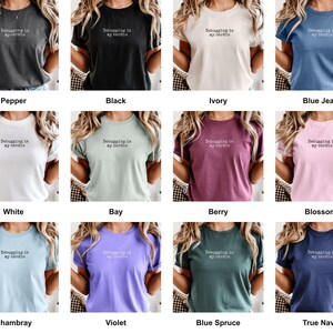 Grid of this t-shirt in each available color, each printed with "Debugging is my cardio" across the chest.