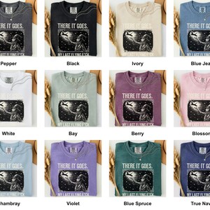 Grid of this t-shirt in each available color, each printed with "Last Flight Skeleton Bat" across the chest (additional view).