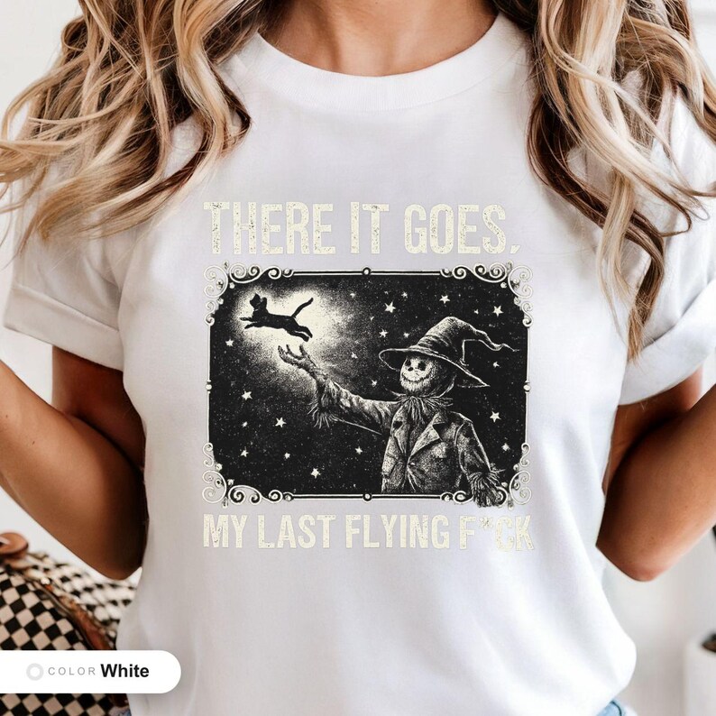 Model wearing a white t-shirt printed with "Last Flight Skeleton Bat" across the chest.