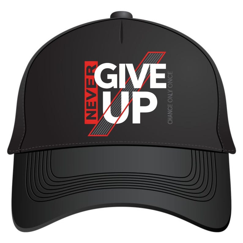 May include: Black baseball cap with the words "NEVER GIVE UP" in white and red lettering. The cap has a curved brim and a button on top. The phrase "CHANGE ONLY ONCE" is printed on the right side of the cap.