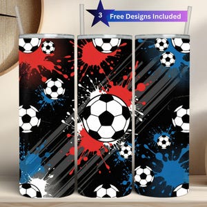 May include: Three cylindrical tumblers with lids and straws, featuring a black background with red and blue paint splatters, diagonal gray stripes, and multiple soccer ball graphics. The text 3 Free Designs Included is visible.