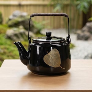 May include: A set of three ceramic mugs with a speckled, matte finish. The mugs are in shades of cream, light gray, and dark gray. Each mug has a simple, minimalist design and a rounded handle.