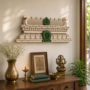 May include: A rectangular wall-mounted wooden architectural element featuring a cream-coloured finish with intricate carved patterns and two prominent green decorative accents centred on the upper and lower horizontal sections.