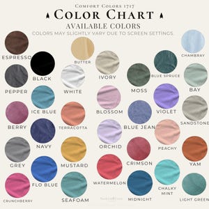 May include: A color chart with the text "Comfort Colors 1717" and "Color Chart." The chart displays a variety of colors, including Espresso, Black, White, Ivory, Moss, and more. Each color is presented in a circular swatch.