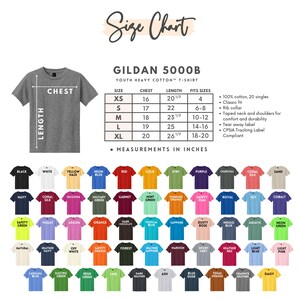 May include: A size chart for Gildan 5000B youth heavy cotton t-shirts. The chart includes chest and length measurements in inches for sizes XS to XL. The image also displays a variety of t-shirt colors, including black, white, and navy.